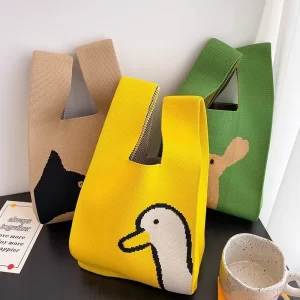 New model mobile phone bag, commuting handbag, portable storage cute cartoon knitted handbag, simple makeup bag